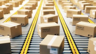 amazon shares represented by lots of boxes on production line ready for shipping