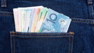 ASX dividend shares represented by cash in jeans back pocket