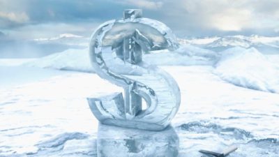 A dollar sign embedded in ice, indicating a share price freeze or trading halt