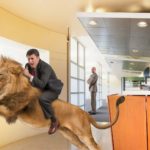 ASX share price rise represented by investor riding atop leaping lion