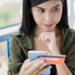 woman using Mastercard