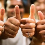 A team of people giving the thumbs up sign representing APA and Wesfarmers doing a deal to study green hydrogen transport using an APA gas pipeline