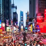 An evening shot of a busy Times Square in New York.