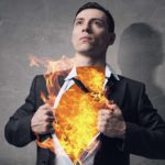 Concept image of a man in a suit with his chest on fire.