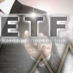 a business person in a suit traces the outline of an upward arrow in a stylised foreground image with the letters ETF and Exchange Traded Funds underneath.