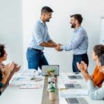 two men shake hands on a deal.