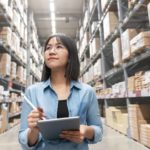 Woman inspecting packages.