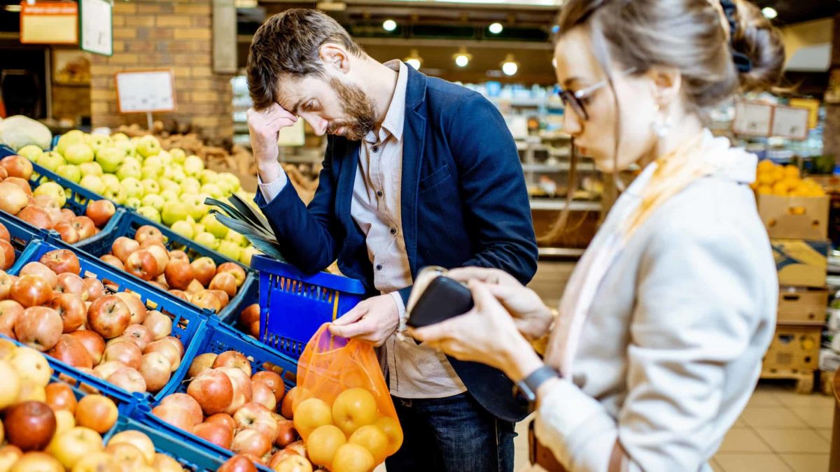 Disappointed couple at a supermarket.