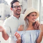 Beautiful young couple enjoying in shopping, symbolising passive income.