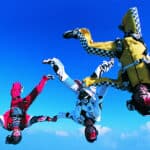 Three people skydiving.