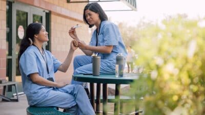 Two health workers taking a break.