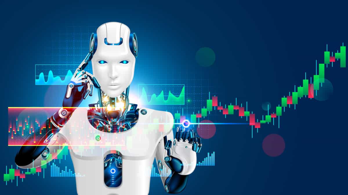 A humanoid robot is pictured looking at a share price chart