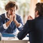 Nervous customer in discussions at a bank.