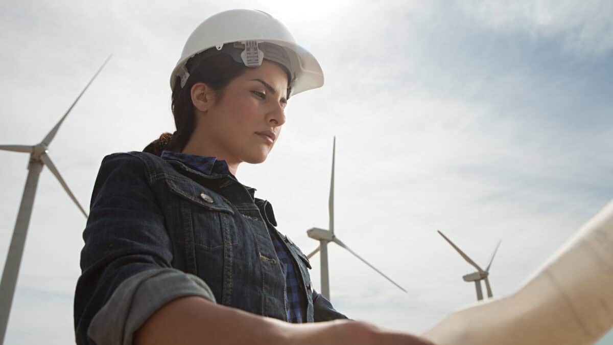 Female engineer at wind farm.